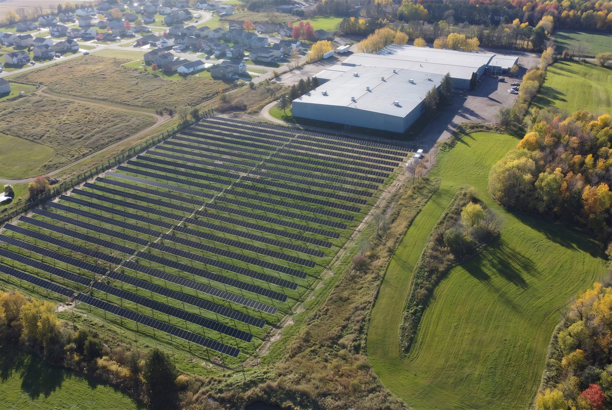 Aerial view of the OlymPak packaging plant and solar array in Mora, Minnesota
